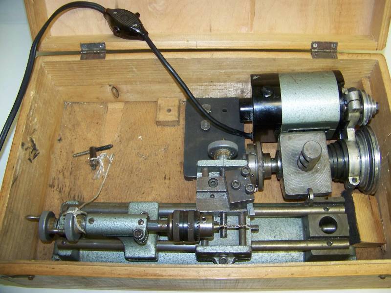 lot 13 image: Unimot, Jewelers Lathe and Jewelers  Clock Repair Tools in Original, Wooden Box