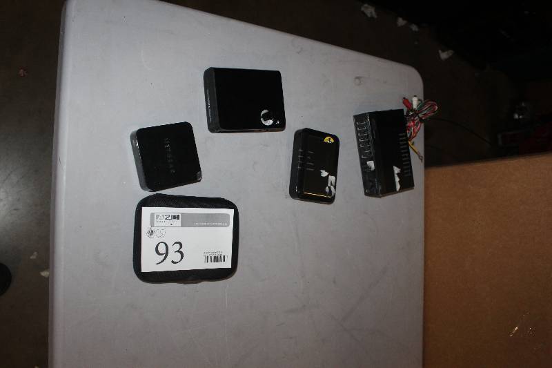 lot 93 image: Lot of (5) Electronics Including 1) Box AND 1) Optimus 40W Car Equalizer AND 1) Modem AND 1) WD TV AND 1) Netgear Neo TV Streaming Player