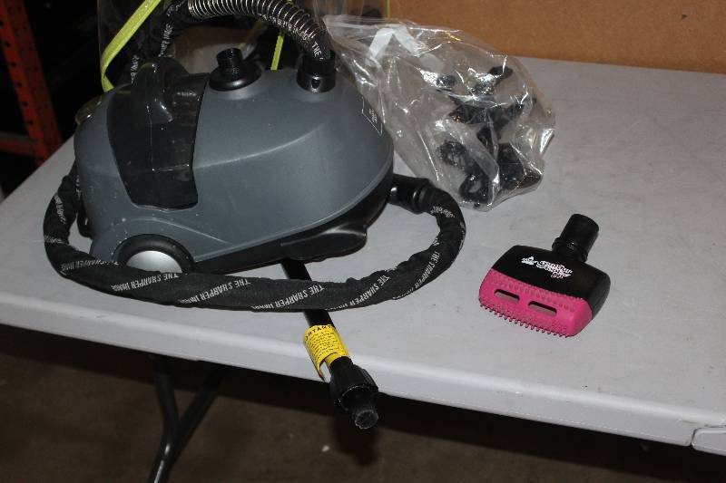 lot 101 image: The Sharper Image Canister Vacuum w Attachments