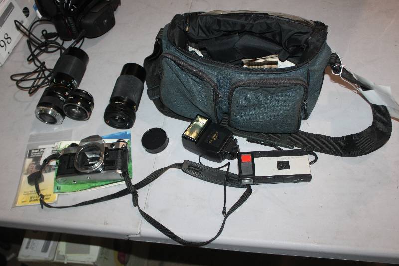 lot 88 image: Lot of (2) Camera Equipment Including 1) Canon AE-1 Program SLR Camera Body AND 1) Camera Bag, Lens, Wireless Adapter, Accessories