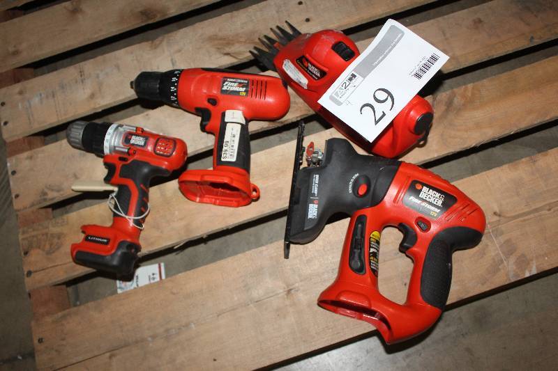 lot 29 image: Lot of (4) Black & Decker Cordless Power Tools Including 2) Drills AND 1) Hedge Clipper AND 1) Jig Saw
