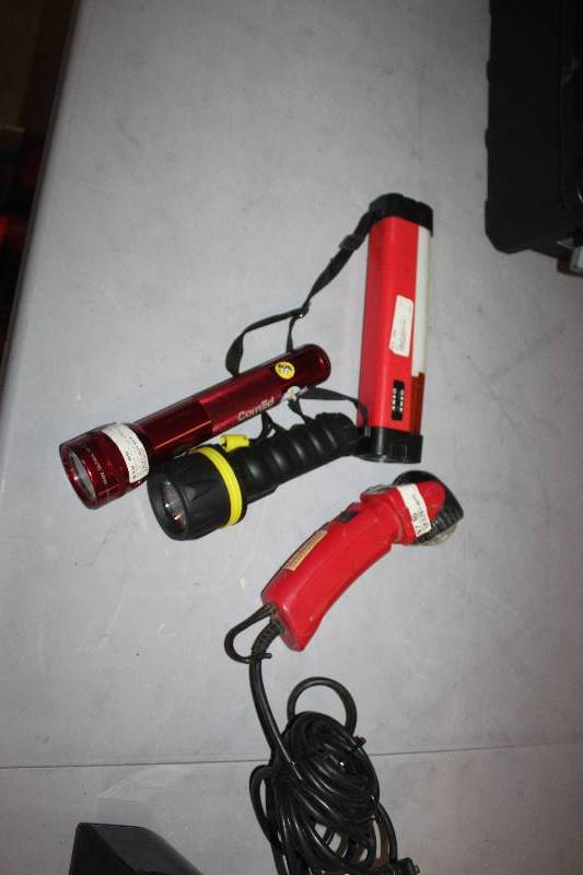 lot 36 image: Lot of (4) Flashlights 1 Corded, 3 Cordless