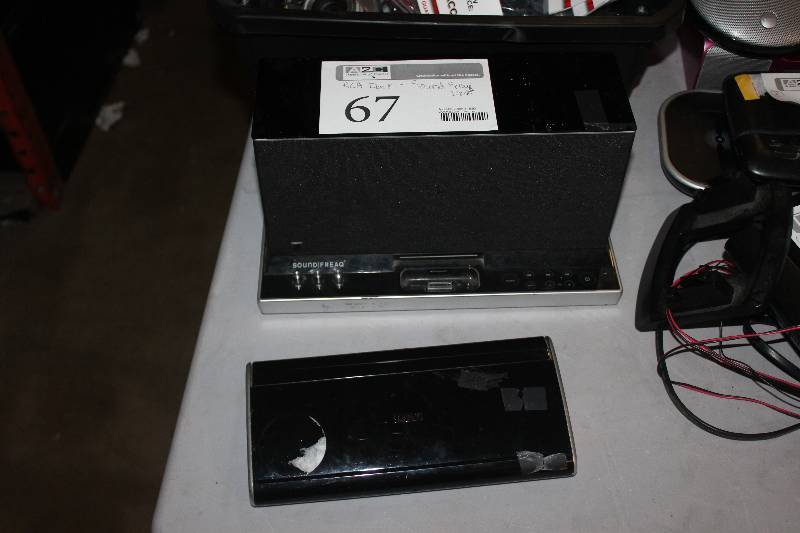 lot 67 image: Lot of (2) Electronics Including 1) RCA Dock AND 1) Sound Freaq Dock