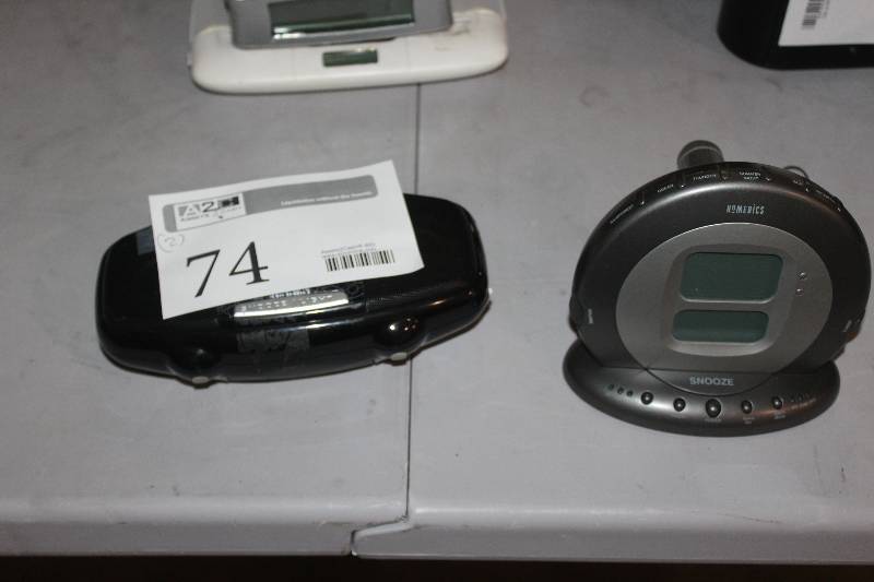 lot 74 image: Lot of (2) Electronics Including 1) HoMedics Music System AND 1) Jensen Docking Digital Music System