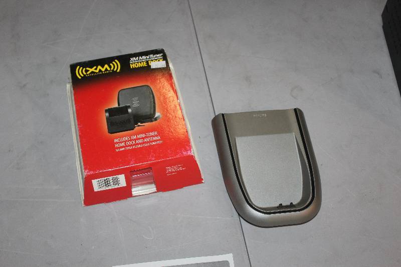 lot 89 image: Lot of (2) Electronics Including 1) XM Satellite Radio Mini-Tuner AND 1) Philips DS3500 Docking Speaker