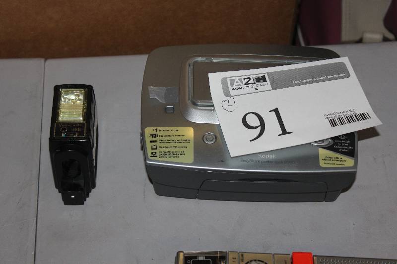 lot 91 image: Lot of (2) Electronics Including 1) Camera Flash AND 1) Kodak EasyShare Printer Dock 6000