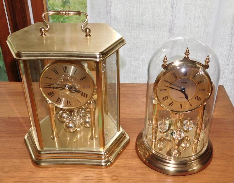 Two battery operated table clocks