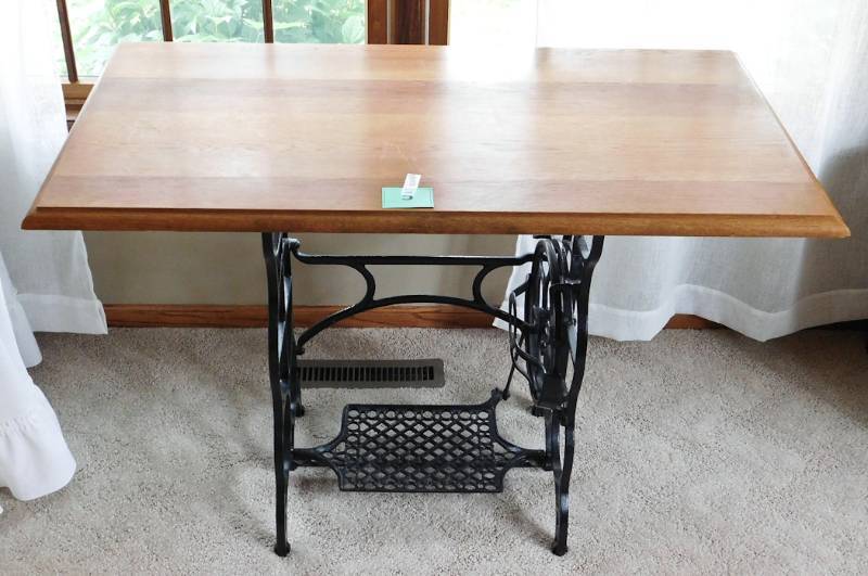 Cast iron sewing base with wooden table top