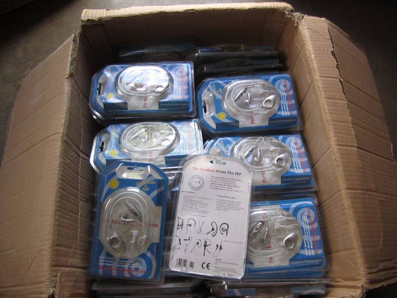 lot 10 image: One case of ear phones...