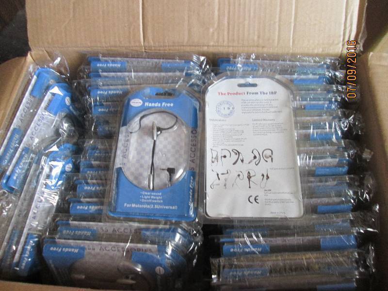 lot 21 image: Case of hands free headsets, 100 to...