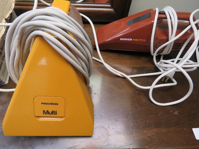 Two Hand Held Vacs
