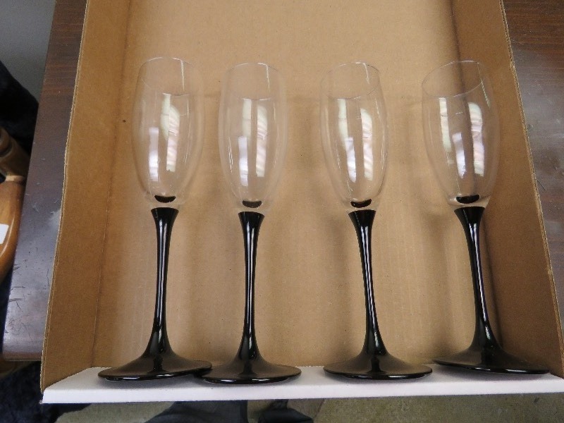 Four Champagne Glasses