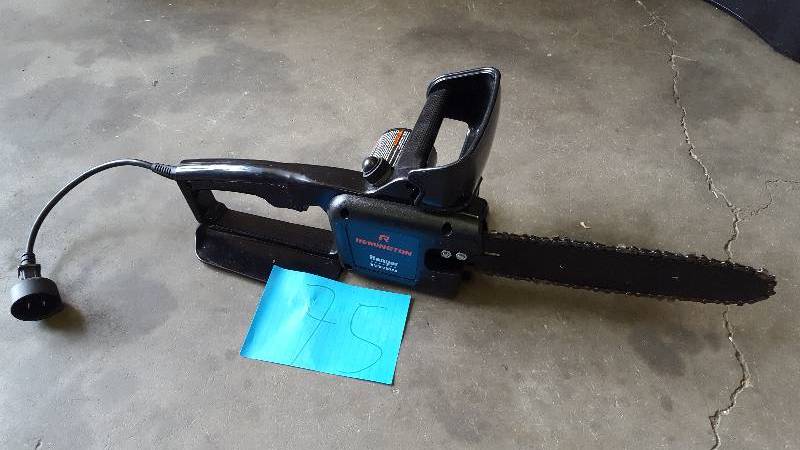 lot 75 image: Remington RM1025SPS 10 in. 8-Amp 2-in-1 Electric chainsaw