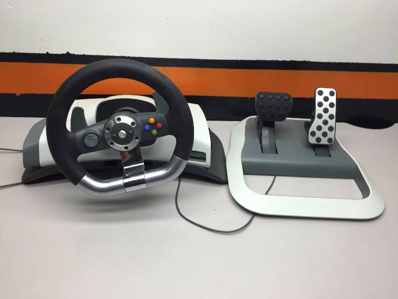 lot 34 image: XBOX CONTROLLER, UNIVERSAL AUDIO VIDEO REMOTE, SUPER MARIO CAMERA, XBOX 360 WIRELESS RACING WHEEL AND PEDALS