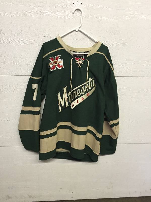 lot 45 image: NDSU SWEAT SHIRT, JERSEYS, BAND UNIFORMS, MINNESOTA WILD JERSEY