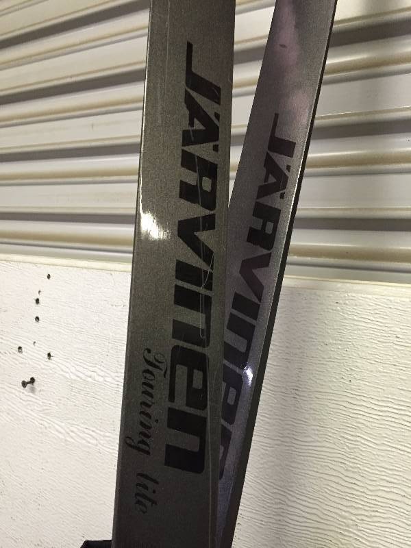 lot 56 image: JARVINEN CROSS COUNTRY SKIS WITH POLES, AR15 GUN CASE