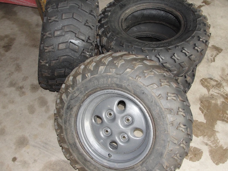 Two AT 205 80 R12 Rubber Tires. Two AT 270 60 R12 Rubber Tires