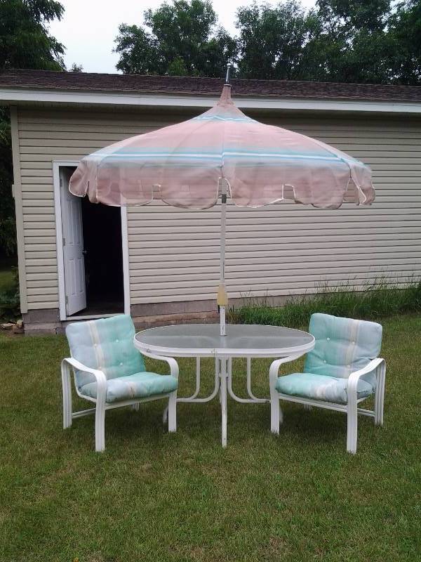 lot 21 image: Oval Glass Top Table With Umbrella & 2- Chairs