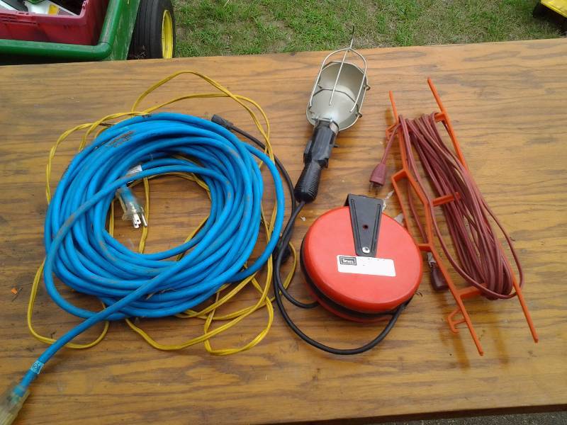 lot 54 image: Extension Cord, Trouble Light, Retractable Extension Cord