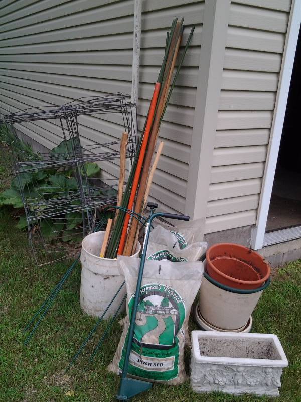 lot 69 image: Lot Of Garden Related-Stakes, Weed Popper, Rock, Cement Planter, More