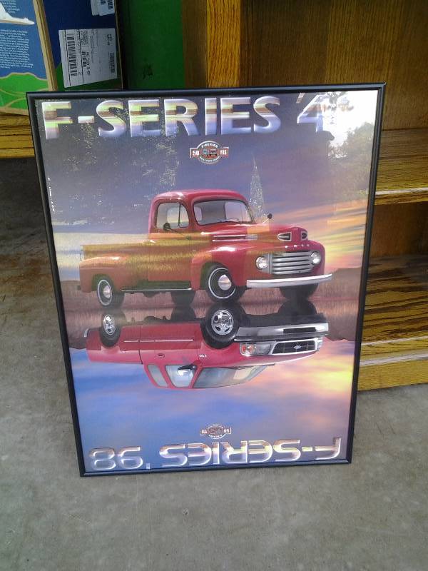 lot 79 image: 50 Years Of Ford Framed Poster 18x24