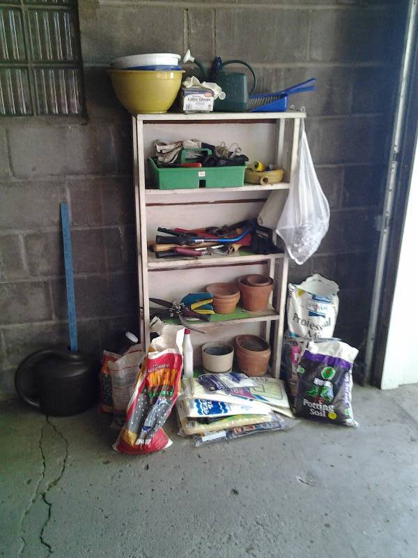 lot 90 image: Shelf & Garden Related, (Pots, Soil, Ice Melt, Pruners, Watering Cans, Clothes Pins)