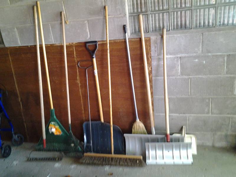 lot 91 image: 9-Implements Snow Shovels, Brooms, Rakes