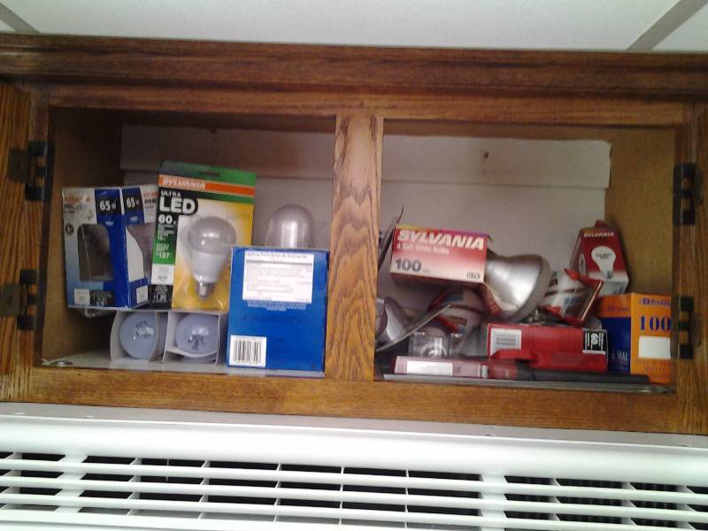 lot 166 image: Cupboard Full Of Light Bulbs