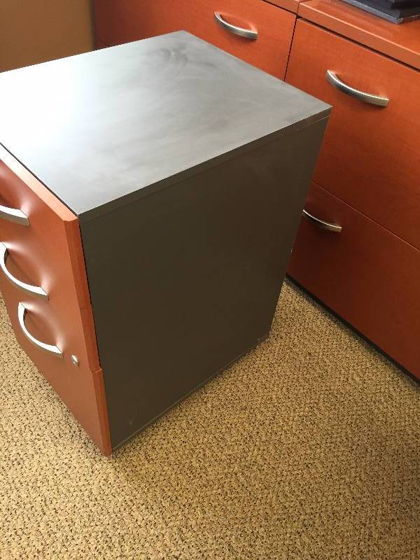 lot 21 image: Bush Quality Furniture Hanson Cherry Veneer & Graphite Under Desk Mobile 3 Drawer Vertical Locking (With Key) Filing Cabinet - Retails $200 - Very Nice - Scuff On Top