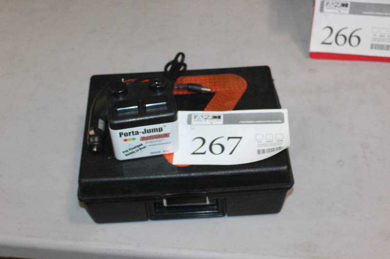 lot 267 image: Lot of (2) Car Accessories Including 1) Porta-Jump Emergency Car Starter AND 1) Emergency Kit w Light, Air, Power
