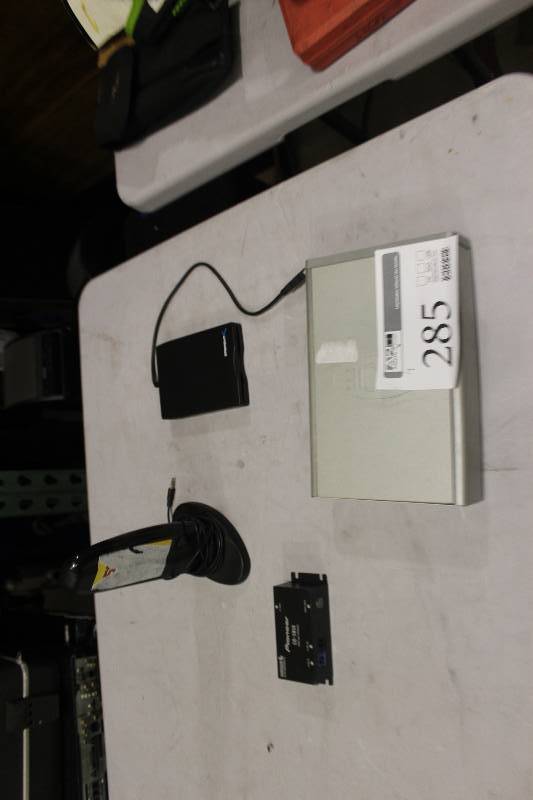 lot 285 image: Lot of (4) Electronics Including 1) Lacie External Hard Drive AND 1) USB Portable Diskette Drive AND 1) Pioneer CD-SB10 Sirius Bus Interface AND 1) Model WSP150