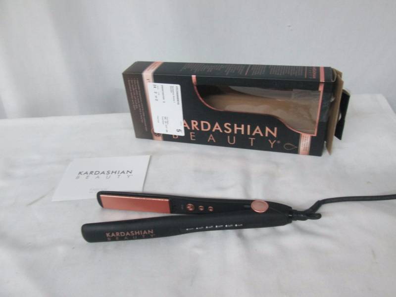 lot 34 image: Kardashian Beauty 1 Hairstyling Iron