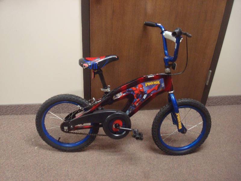 lot 5 image: Boys Spiderman Bike, Used, Shows Wear...