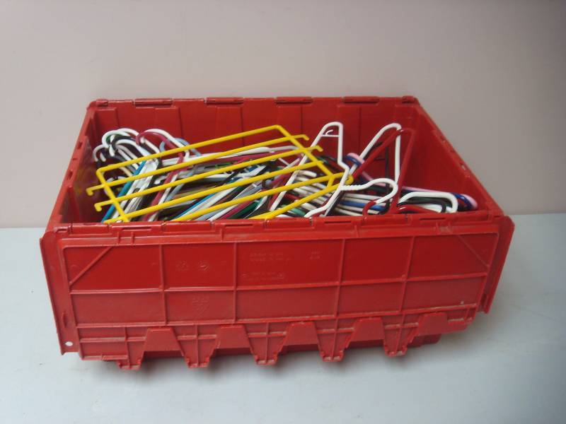 lot 41 image: Lot Of Hangers In Plastic Storage Bin...
