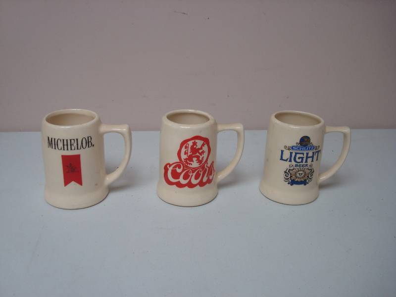 lot 62 image: Lot Of Beer Steins, Coors Has A Hairline Crac...