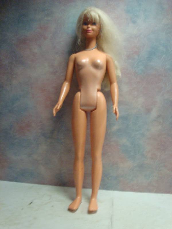 lot 93 image: Very Large Barbie Doll, Some Marks On It...