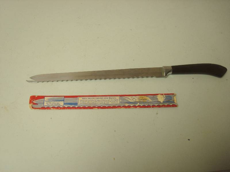 lot 104 image: Quikut Kitchen Knife, Used...
