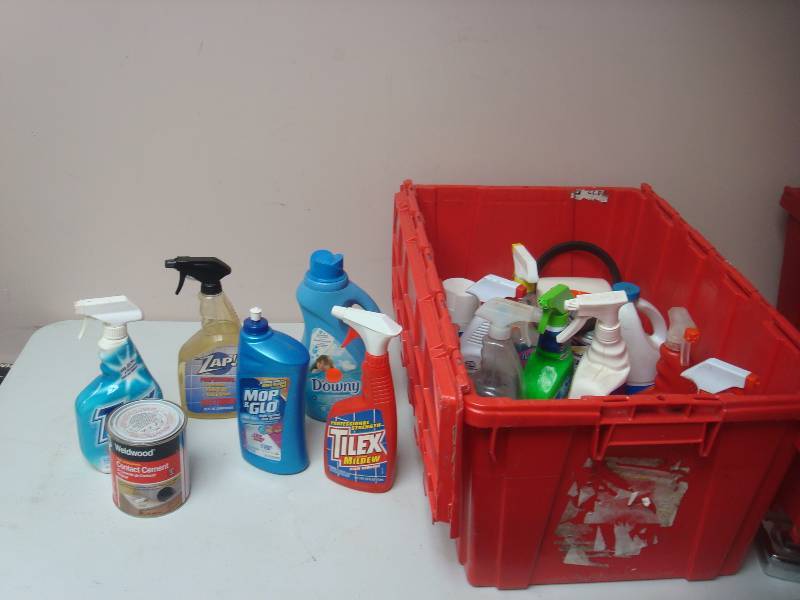 lot 128 image: Red Bin Filled With Cleaning Products...