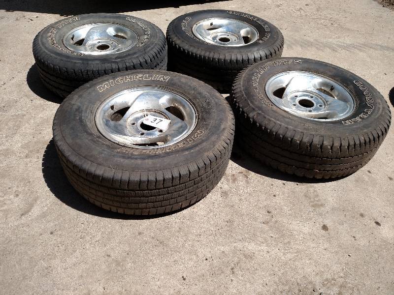 (4) Goodyear Wrangler RTS P26575R...