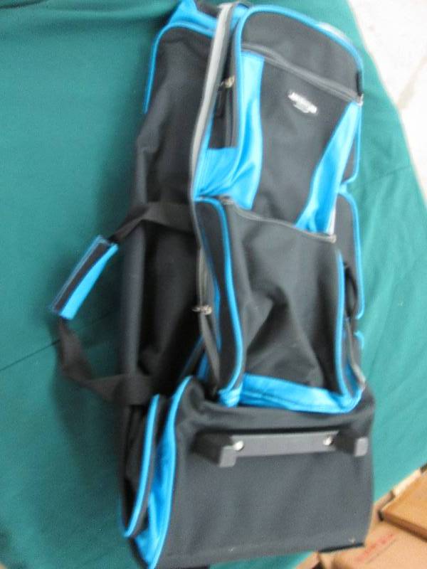 Black with Teal accents roller bag ...