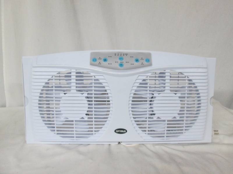 lot 44 image: Optimus Electrically Reversible Twin Window Fan