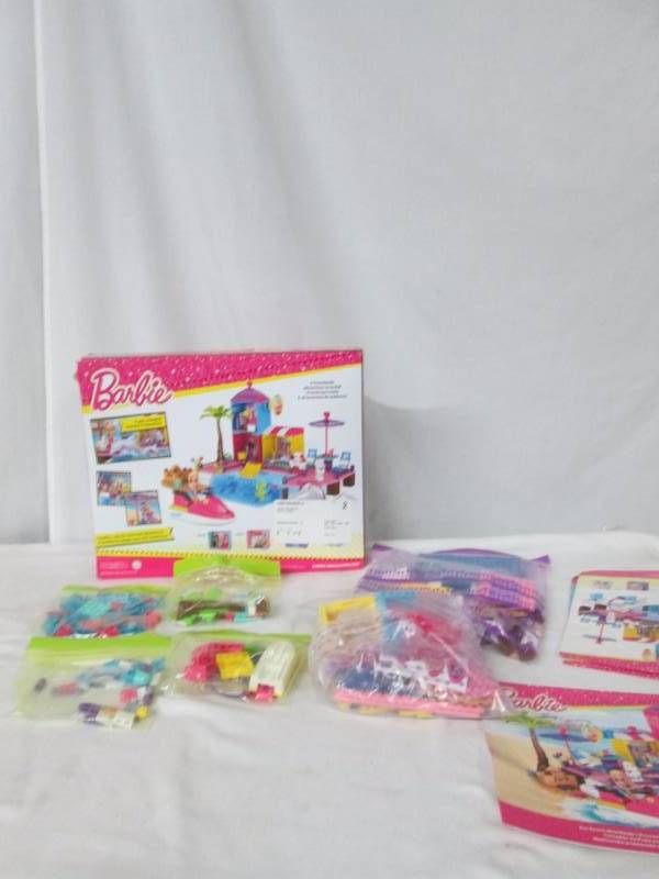lot 78 image: Mattel Mega Bloks Barbie Pet Beach Boardwalk Building Set