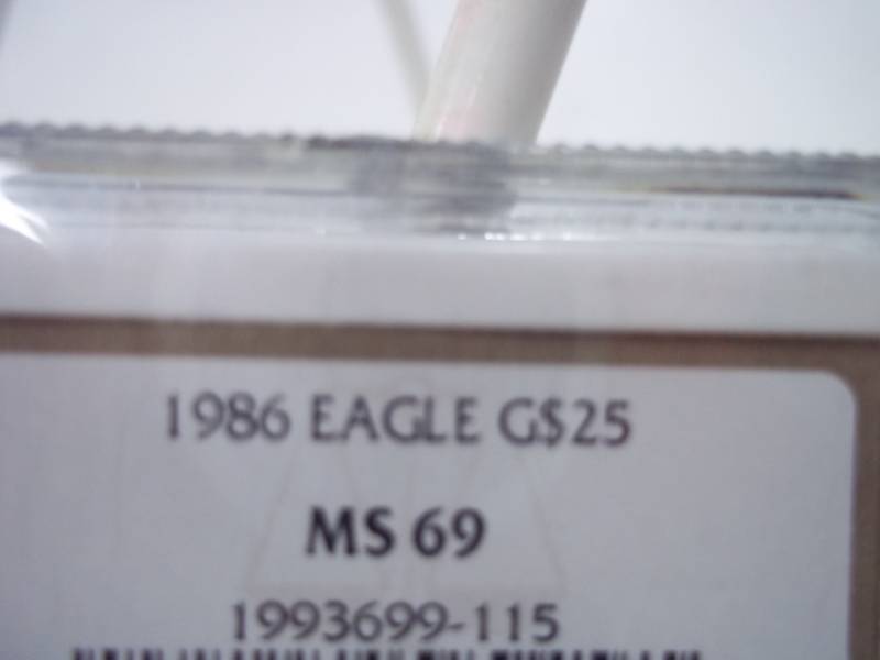 12 oz.  Fine Gold $25.00 1986 Eagle G$25  MS 69