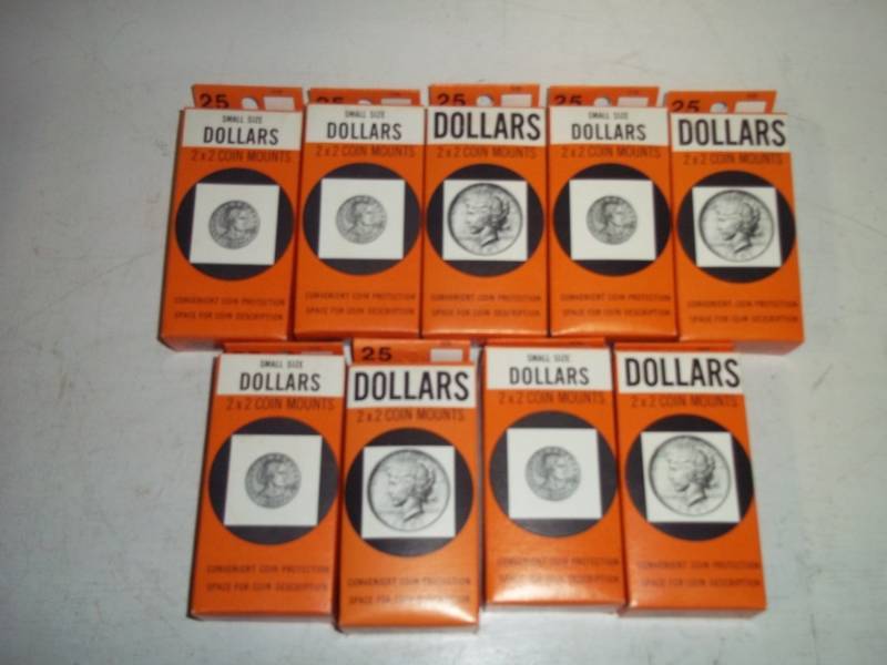 9 Boxes of Dollar Coin mounts