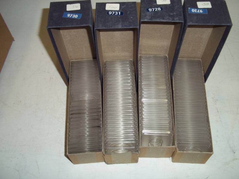 4 Boxes of Plastic coin mounts 2 x 2