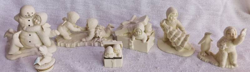 lot 54 image: lot of snowbabies Signed by local artist family friend