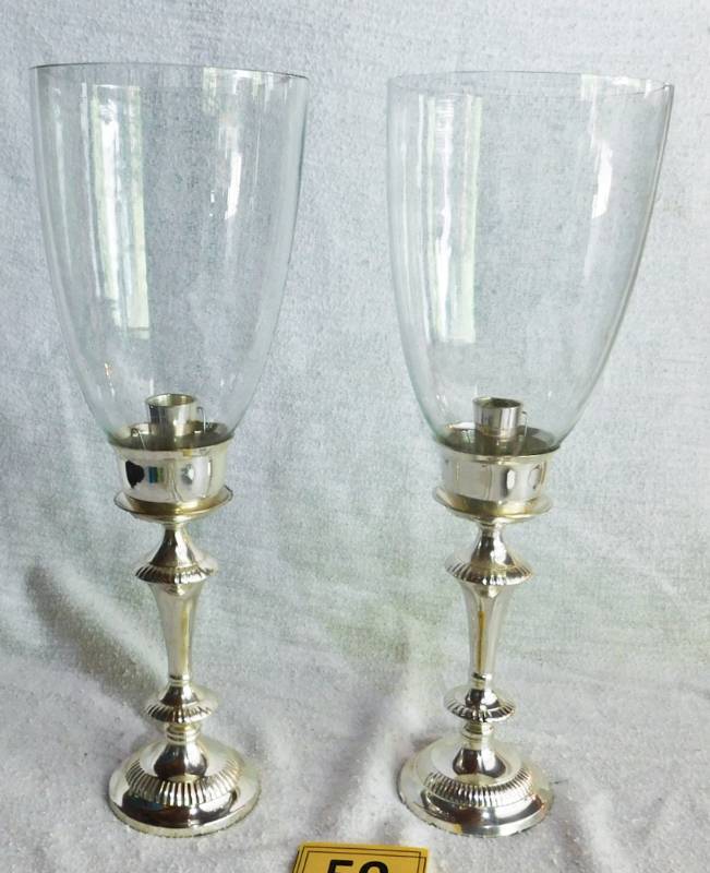 lot 59 image: S. N. K. ENT silver plated and glass candle holder pair