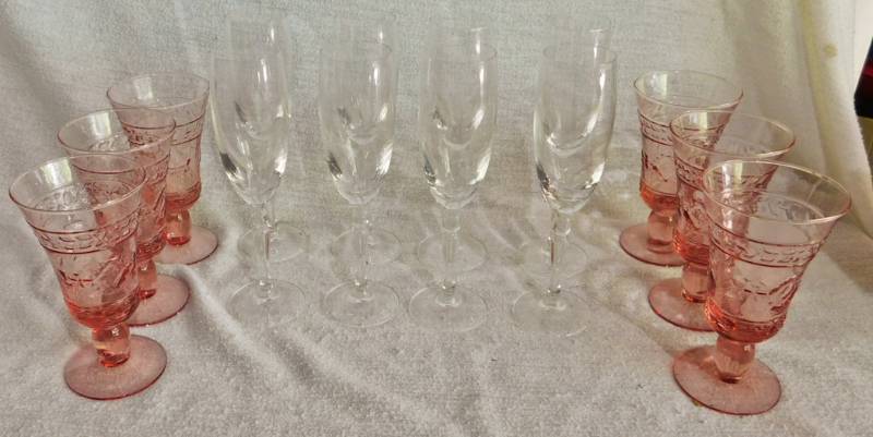 lot 62 image: 8 champagne flutes and 6 pink goblets