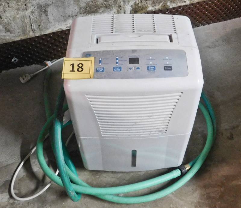 lot 18 image: GE 30 Pint Dehumidifier ADEL30LRQ1 that works great. See pictures