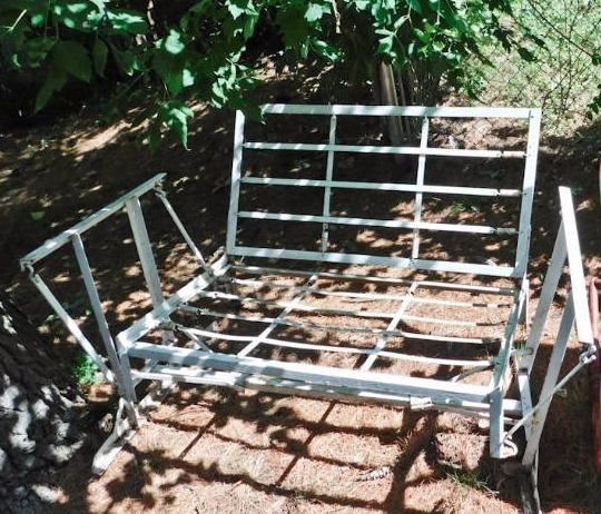 lot 134 image: white metal gliding outdoor loveseat